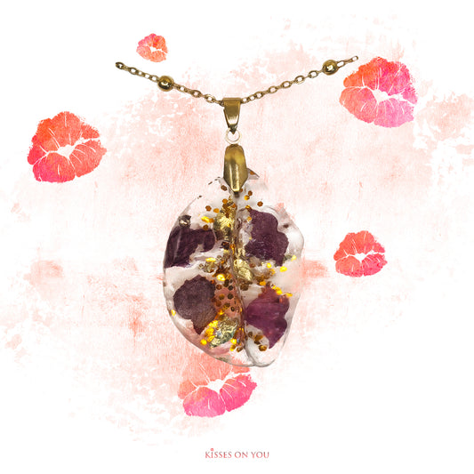 rose petal kisses set in resin big kiss pendant with gold leaf and sparkles with 14K gold plated chain