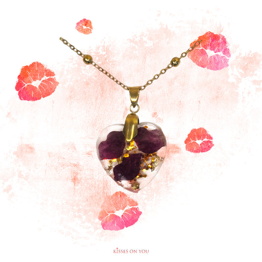 rose petal kisses set in resin heart pendant with gold leaf and sparkles with 14K gold chain