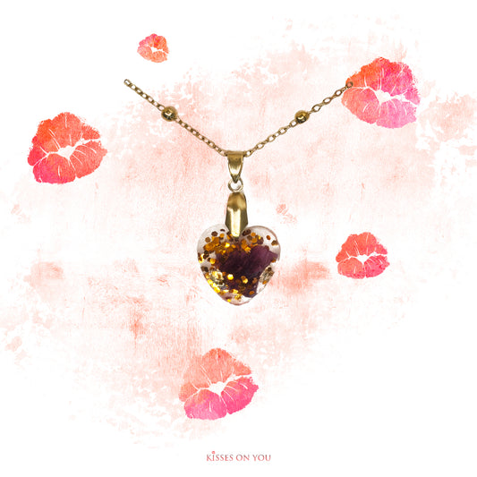 rose petal kisses set in resin small heart pendant with gold leaf and sparkles with 14K gold plated chain